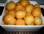 Дрожжевые пончики в лимоном сиропе