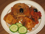 Курица,тушеная с маслинами и овощами и с добавлением гнезд.
